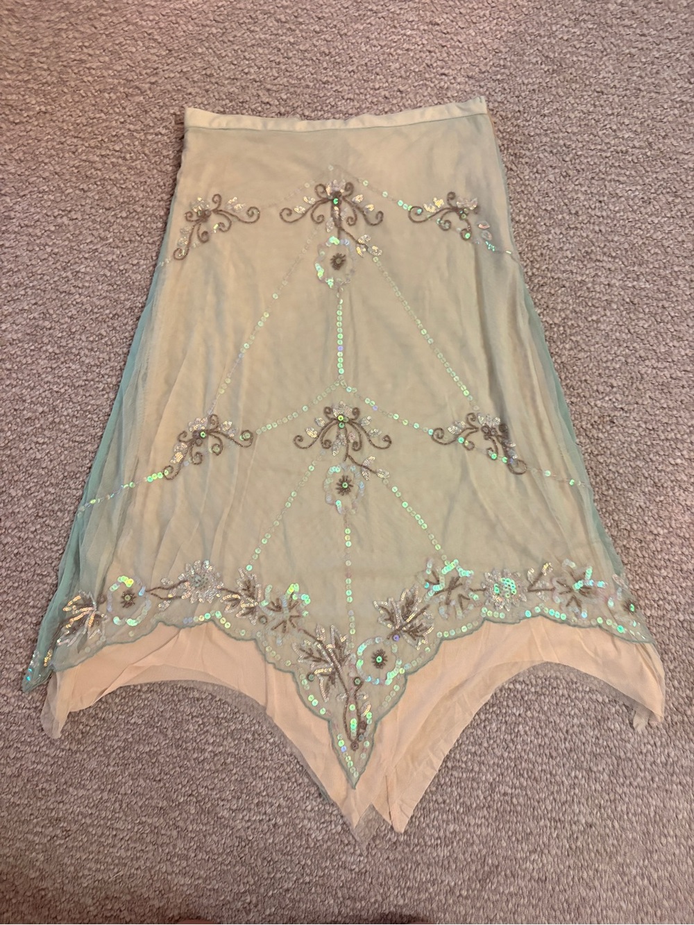 Urban Outfitters mermaid embroidered, and sequin layered skirt.